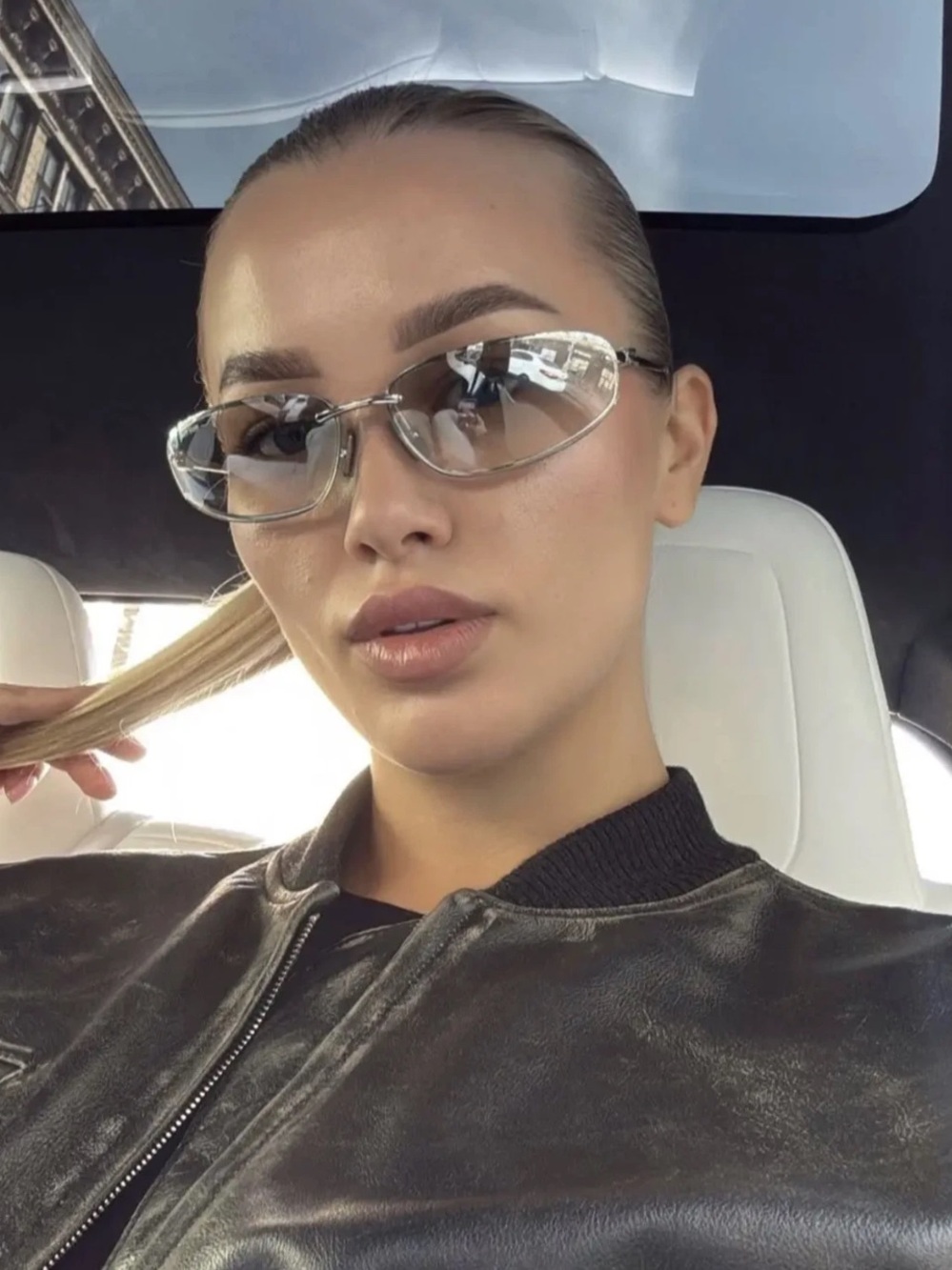 Miu Miu Transparent Rimless Sunglasses with Silver Accents
